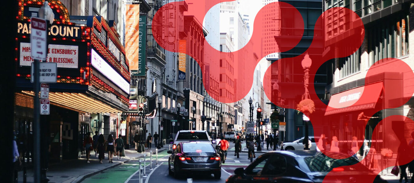 Downtown Boston city street with people connecting tomorrow